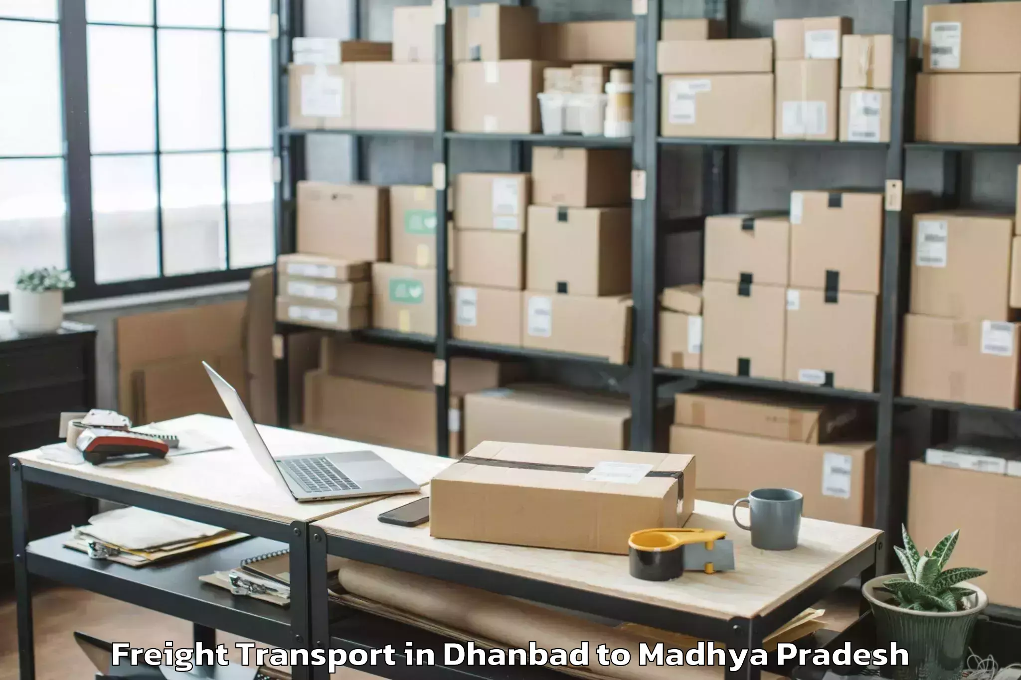 Book Dhanbad to Barnagar Pt Freight Transport Online